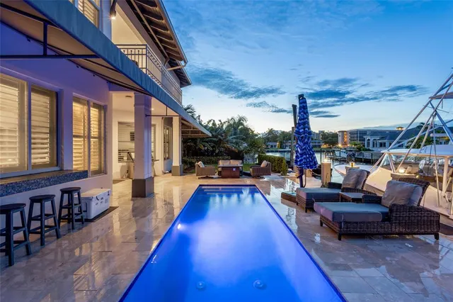 a view of a living room and balcony