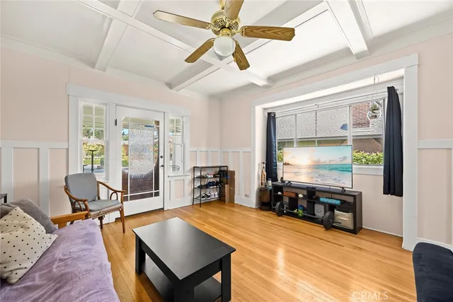 a kitchen with stainless steel appliances a refrigerator sink and cabinets