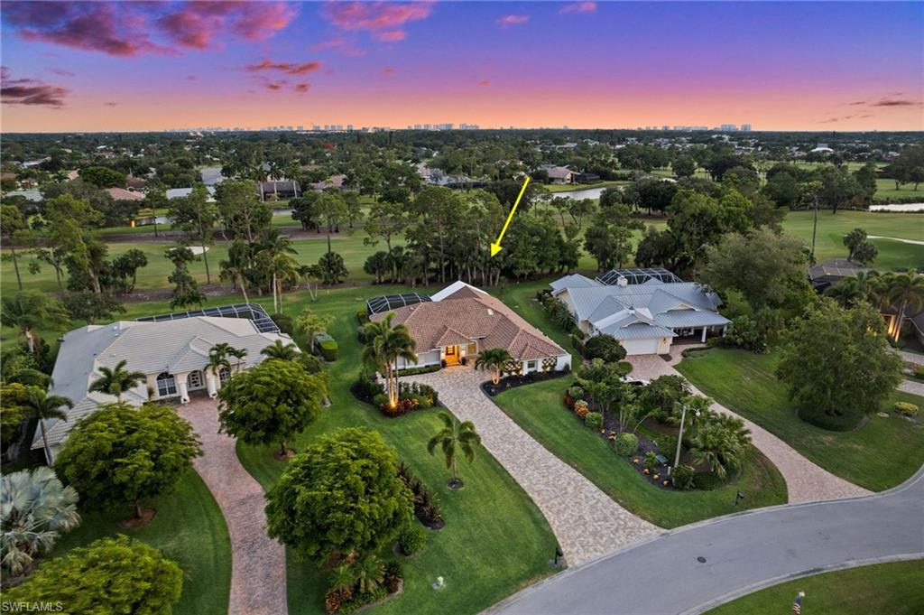 2022 Duke Drive Naples, FL 34110 - Photo 33 of 40 an aerial view of residential houses with outdoor space and street view