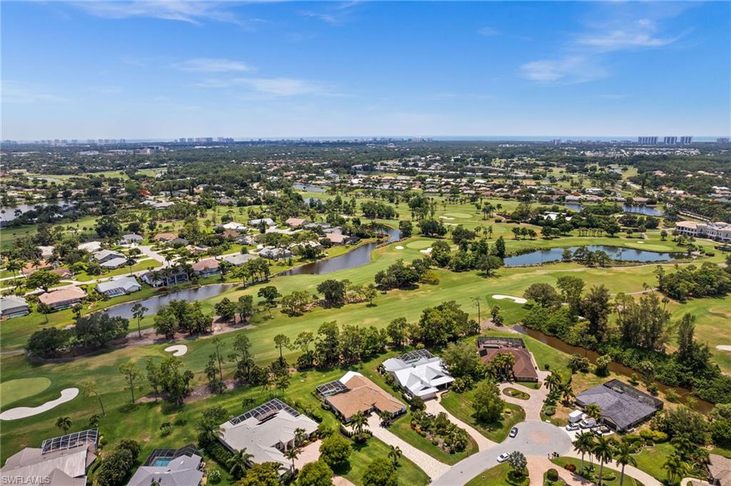 2022 Duke Drive Naples, FL 34110 - Photo 37 of 40 an aerial view of a city with lots of residential buildings