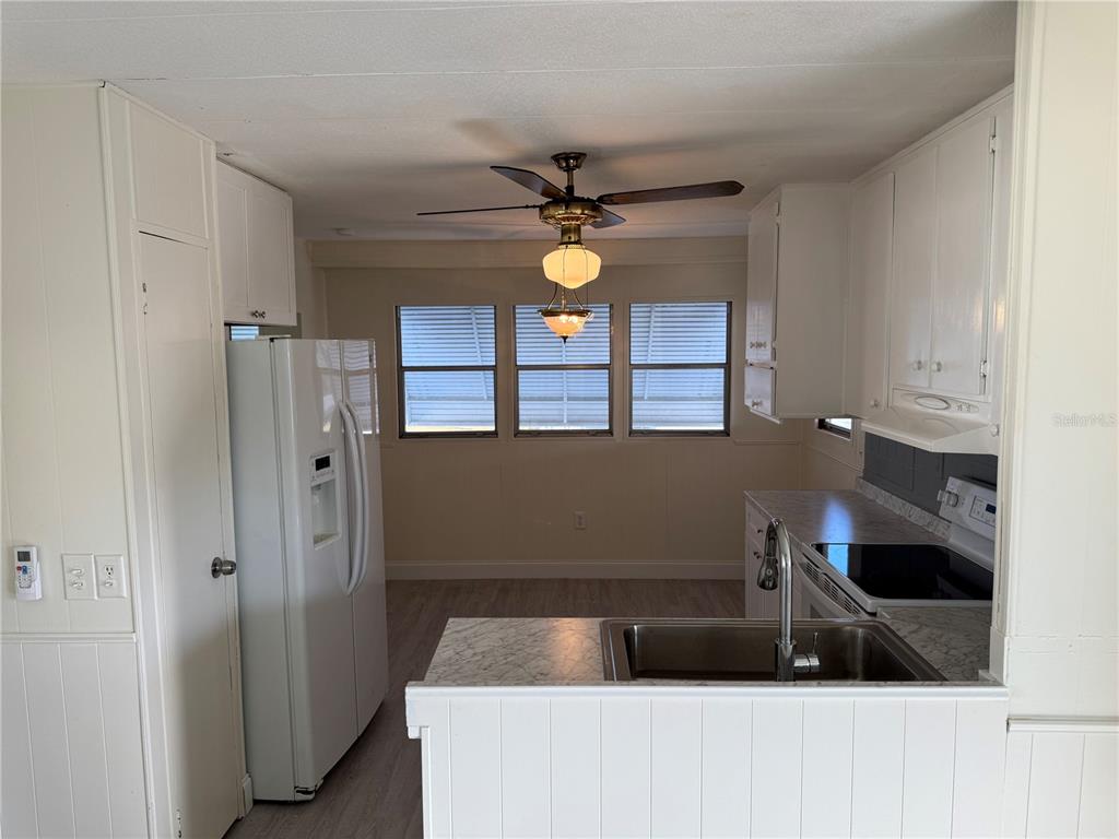 10805 Tioga Drive Port Richey, FL 34668 - Photo 5 of 15 a bathroom with a sink and a mirror