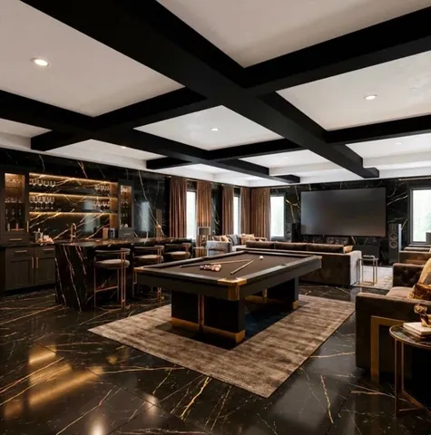 a kitchen with stainless steel appliances granite countertop a stove and a refrigerator