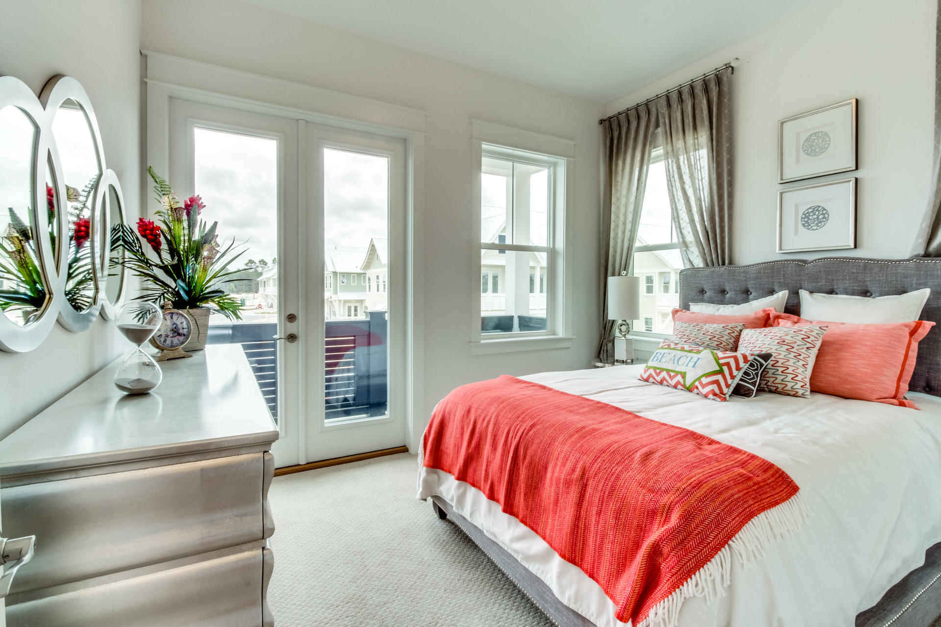 79 Pine Lands Loop Inlet Beach East, Unit C Inlet Beach, FL 32461 - Photo 6 of 20 a bedroom with a large bed and a potted plant