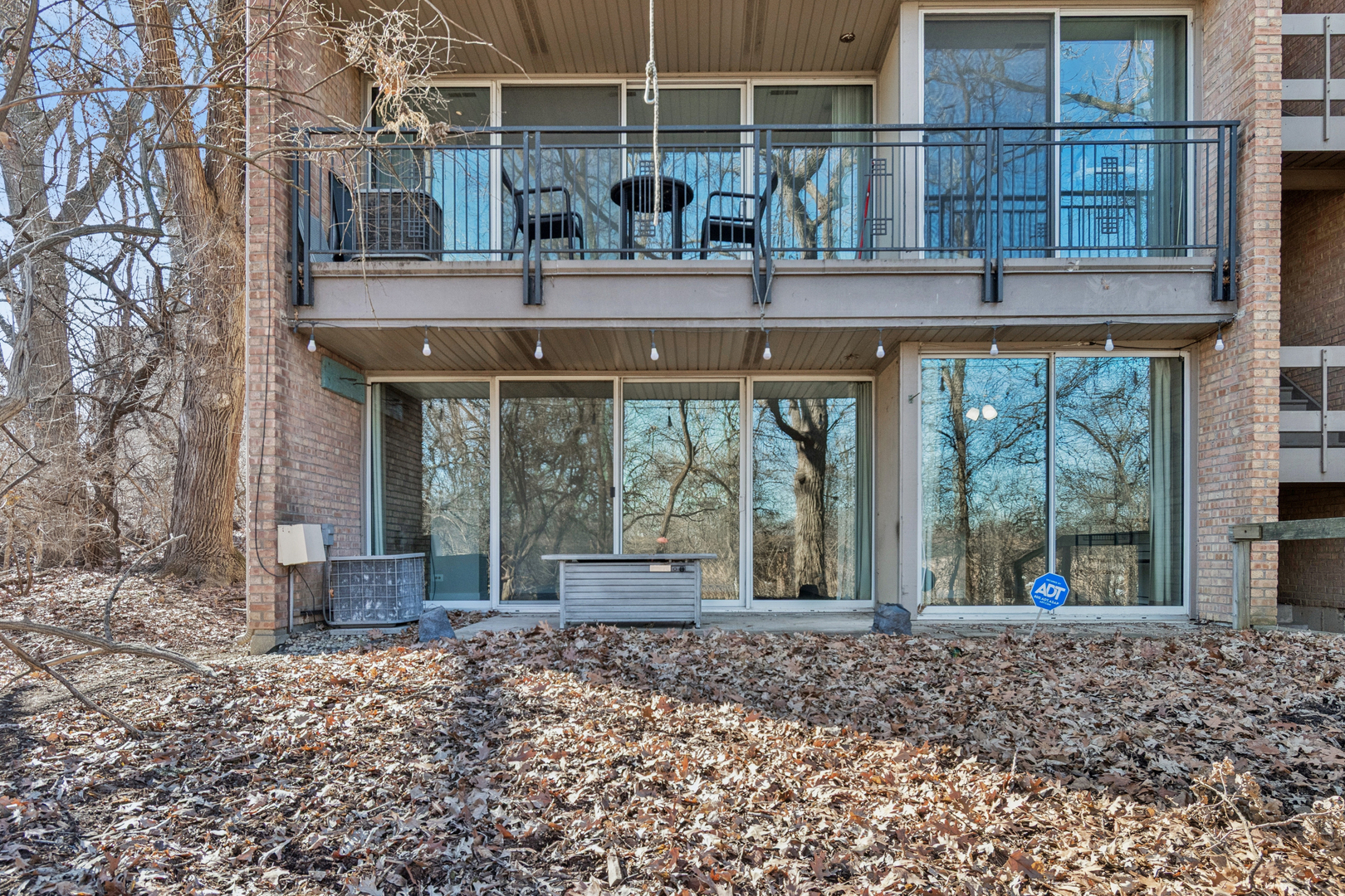 6012 Forest View Road, Unit 1D Lisle, IL 60532 - Photo 19 of 21 a front view of a house with a porch