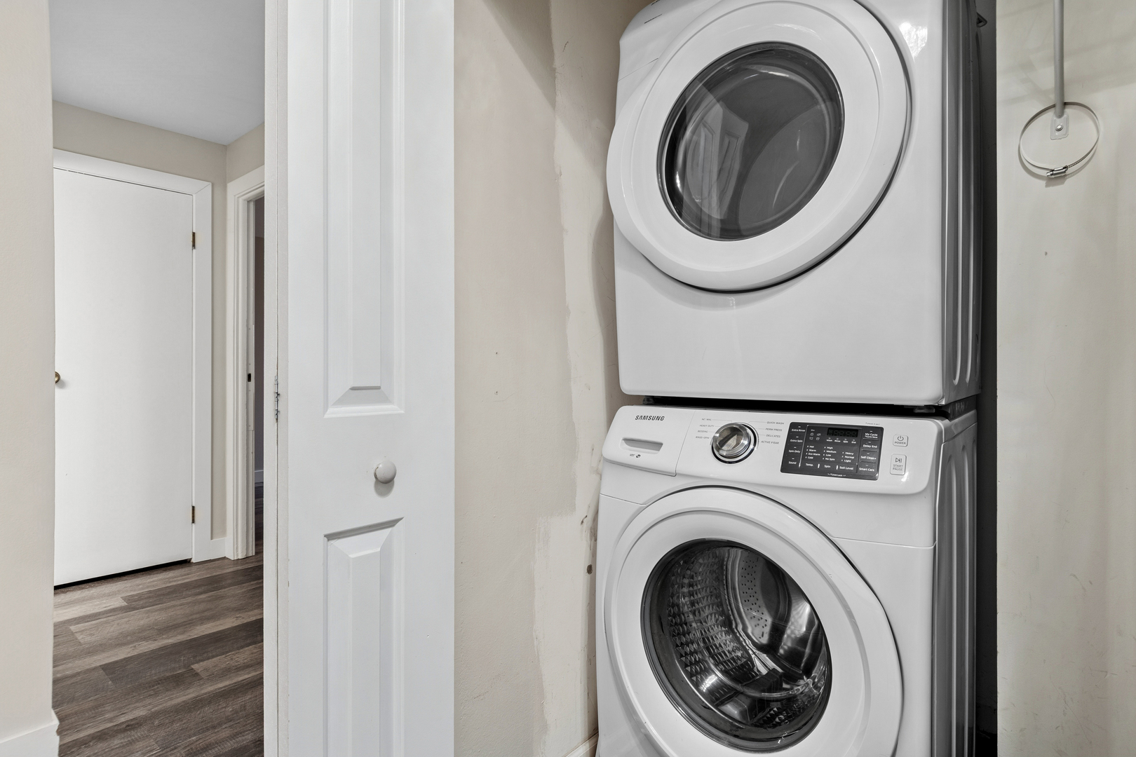 6012 Forest View Road, Unit 1D Lisle, IL 60532 - Photo 3 of 21 a close view of a utility room with dryer and washer