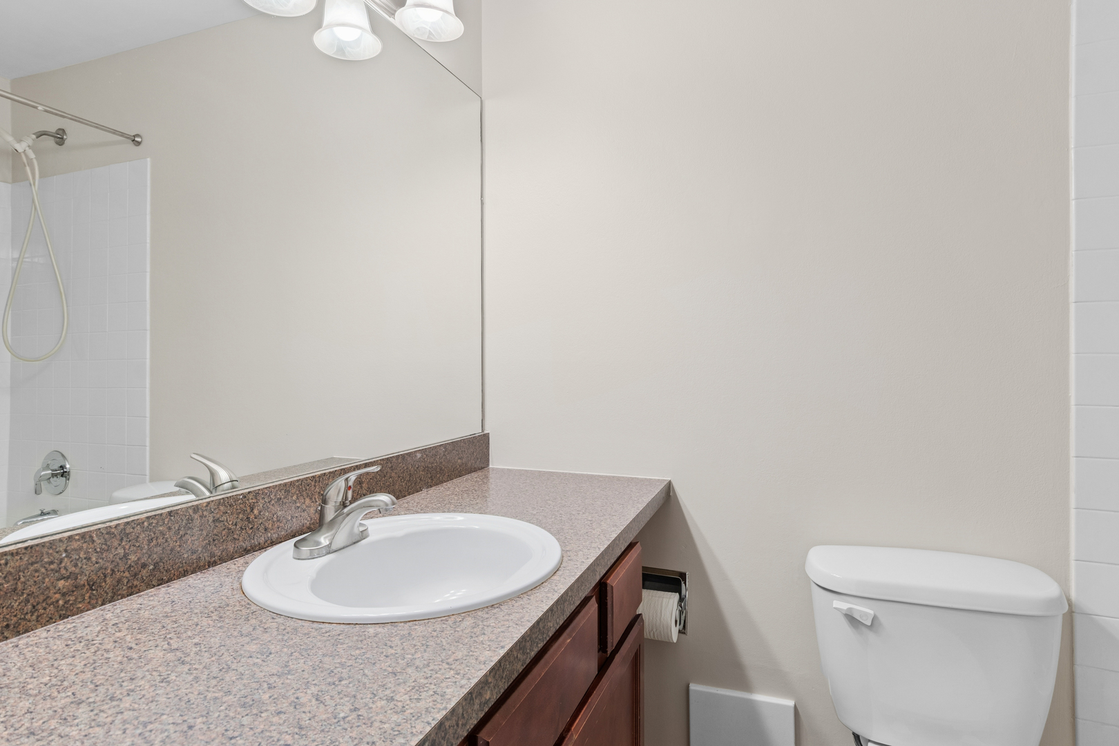 6012 Forest View Road, Unit 1D Lisle, IL 60532 - Photo 8 of 21 a bathroom with a sink and a toilet