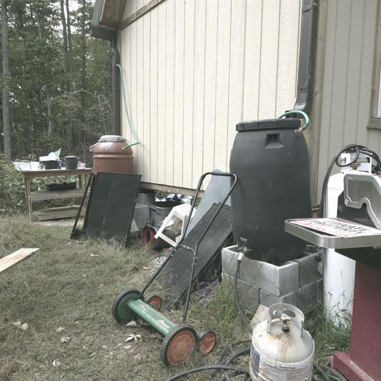 1251 Rambling Road Fairmount, GA 30139 - Photo 15 of 23 a living room with furniture and a floor to ceiling window