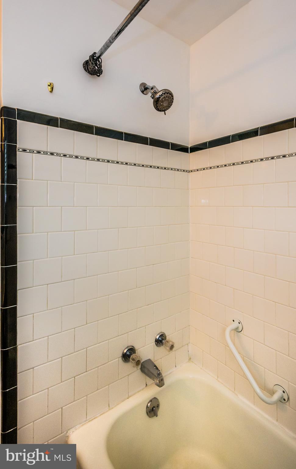 3829 Monterey Road Baltimore, MD 21218 - Photo 22 of 25 a bathroom with a sink and a shower