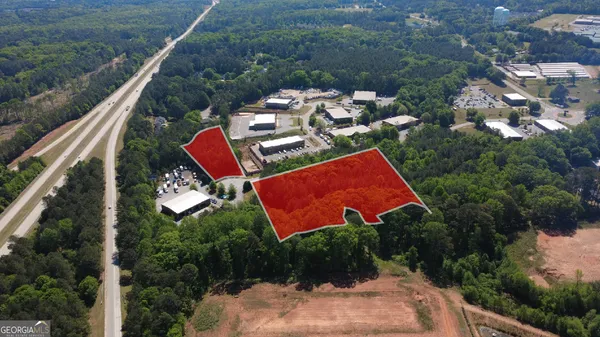 an aerial view of house with yard swimming pool and outdoor seating
