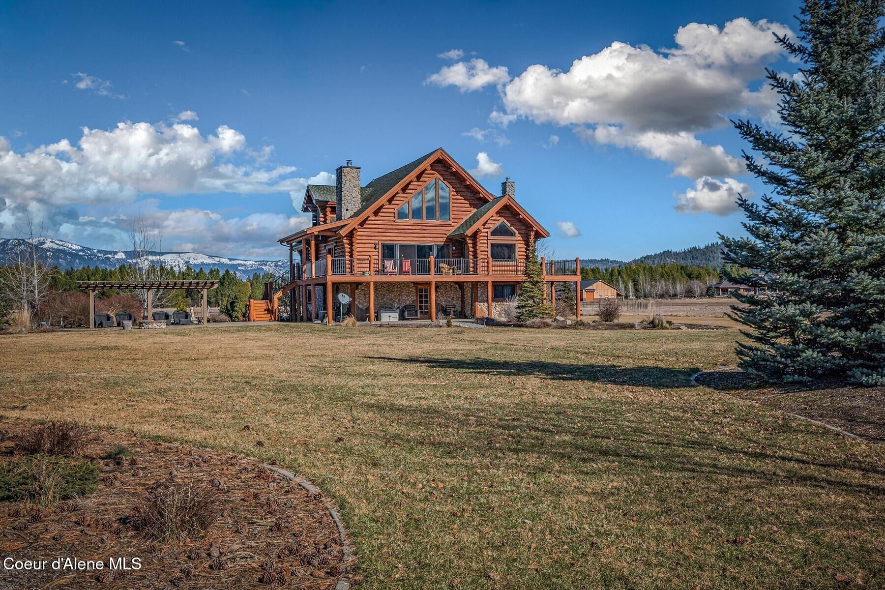 296 Camp Peine Road Sagle, ID 83860 - Photo 13 of 69 Lawn down to beach