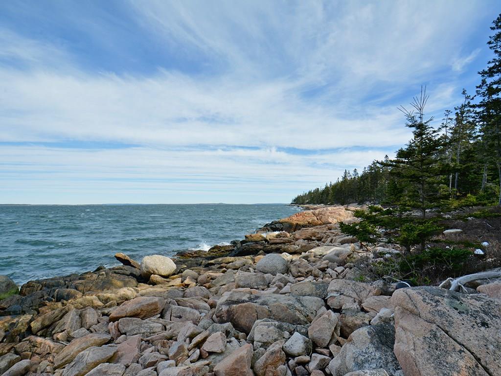 587 Jericho Bay Road Swans Island, ME 04685 - Photo 3 of 33 Pink granite coastline.