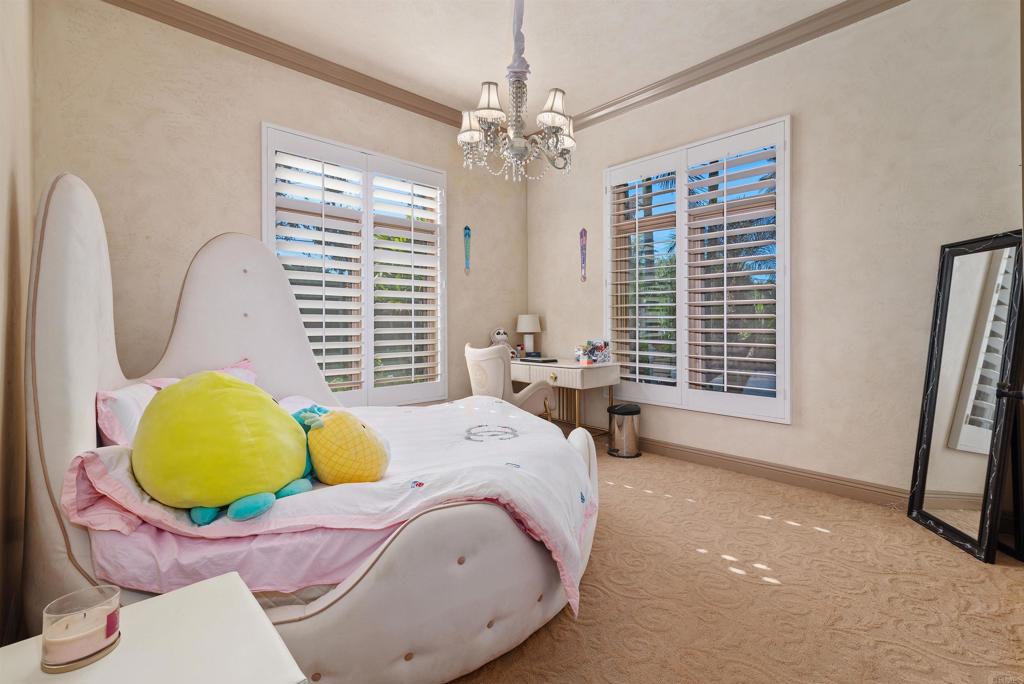 18545 Aliso Canyon Road Rancho Santa Fe, CA 92091 - Photo 30 of 48 a bedroom with bed and wooden floor