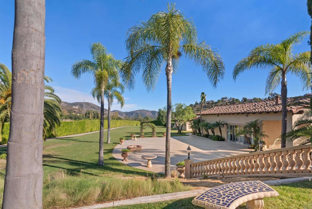 18545 Aliso Canyon Road Rancho Santa Fe, CA 92091 - Photo 44 of 48 a view of a house with a swimming pool