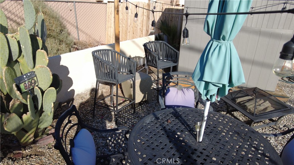 4561 Adobe Road, Unit 1 Twentynine Palms, CA 92277 - Photo 15 of 57 a view of balcony with furniture