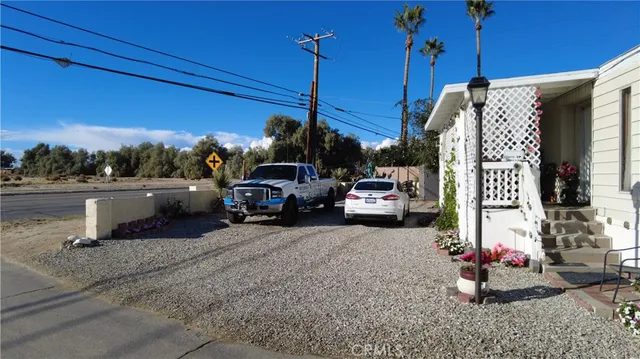 a view of street with parked cars