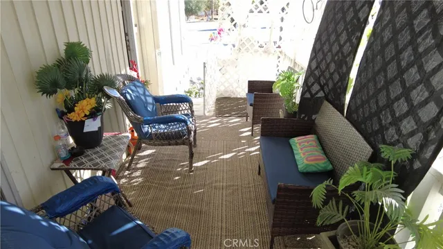 a living room with furniture and a couch