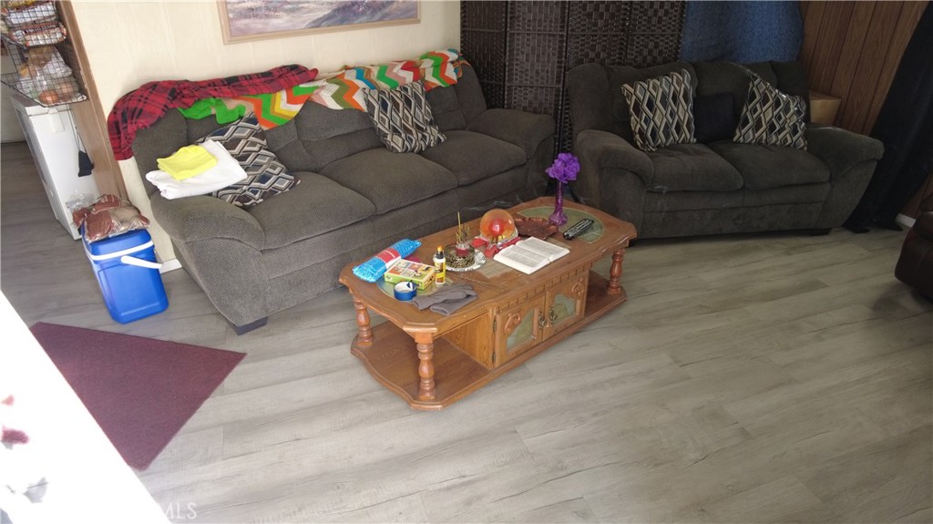 4561 Adobe Road, Unit 1 Twentynine Palms, CA 92277 - Photo 23 of 57 a living room with furniture and a couch