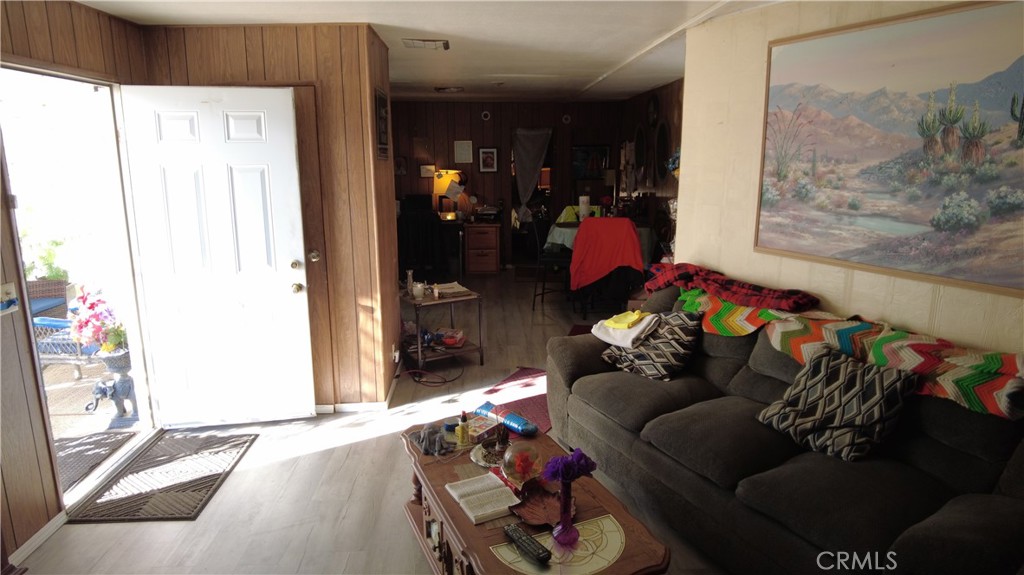 4561 Adobe Road, Unit 1 Twentynine Palms, CA 92277 - Photo 28 of 57 a living room with furniture and a window