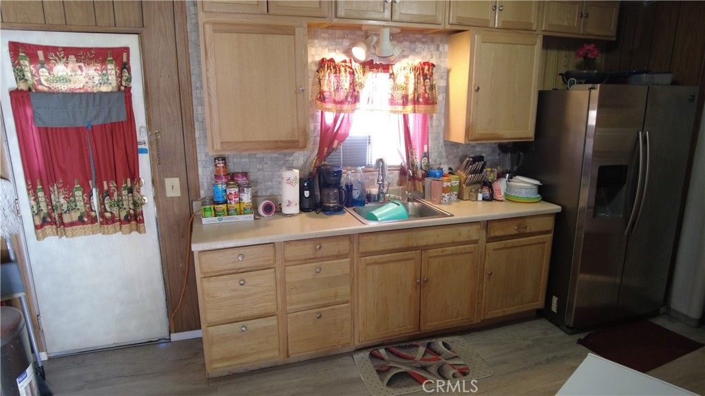4561 Adobe Road, Unit 1 Twentynine Palms, CA 92277 - Photo 33 of 57 a bathroom with a sink and a mirror