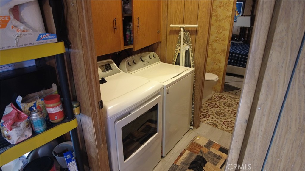 4561 Adobe Road, Unit 1 Twentynine Palms, CA 92277 - Photo 35 of 57 a utility room with dryer and washer