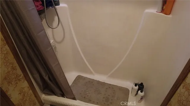 a bathroom with a sink toilet and tub