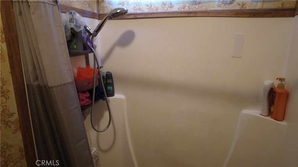 4561 Adobe Road, Unit 1 Twentynine Palms, CA 92277 - Photo 40 of 57 a bathroom with a shower