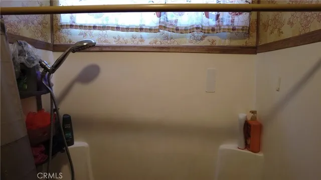 a bathroom with a sink and toilet