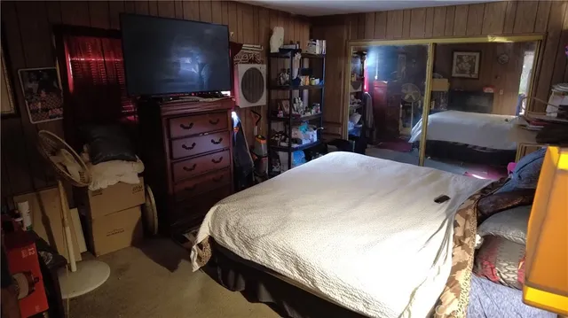 a bathroom with a sink mirror and toilet