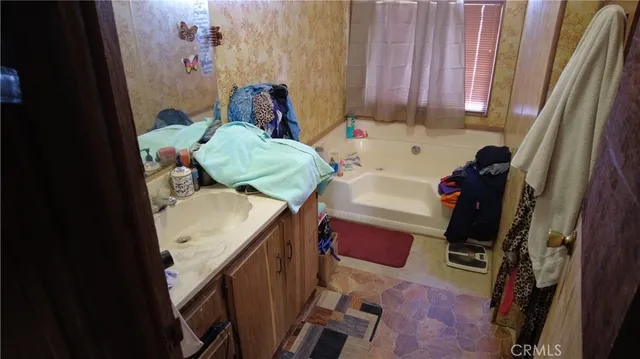 a room with furniture and a flat screen tv