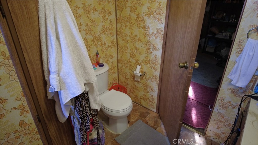 4561 Adobe Road, Unit 1 Twentynine Palms, CA 92277 - Photo 46 of 57 a bathroom with a sink and toilet