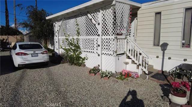 a view of a house with a garden