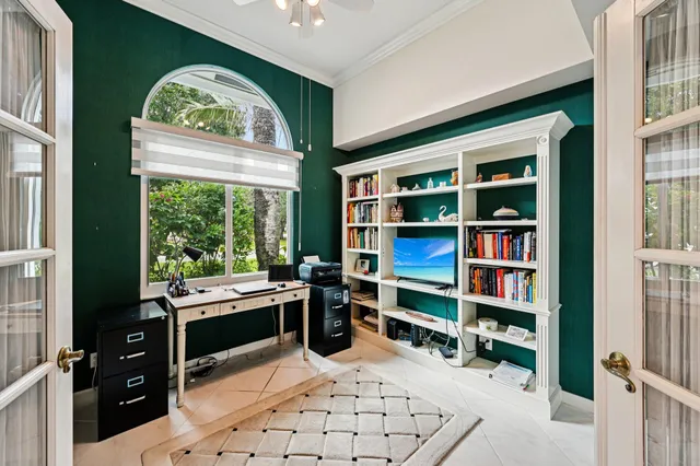 a view of walk in closet with clothes