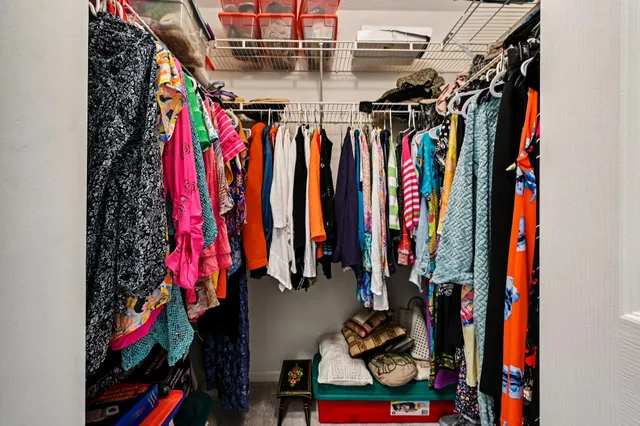 a backyard of a house with a garden and outdoor seating