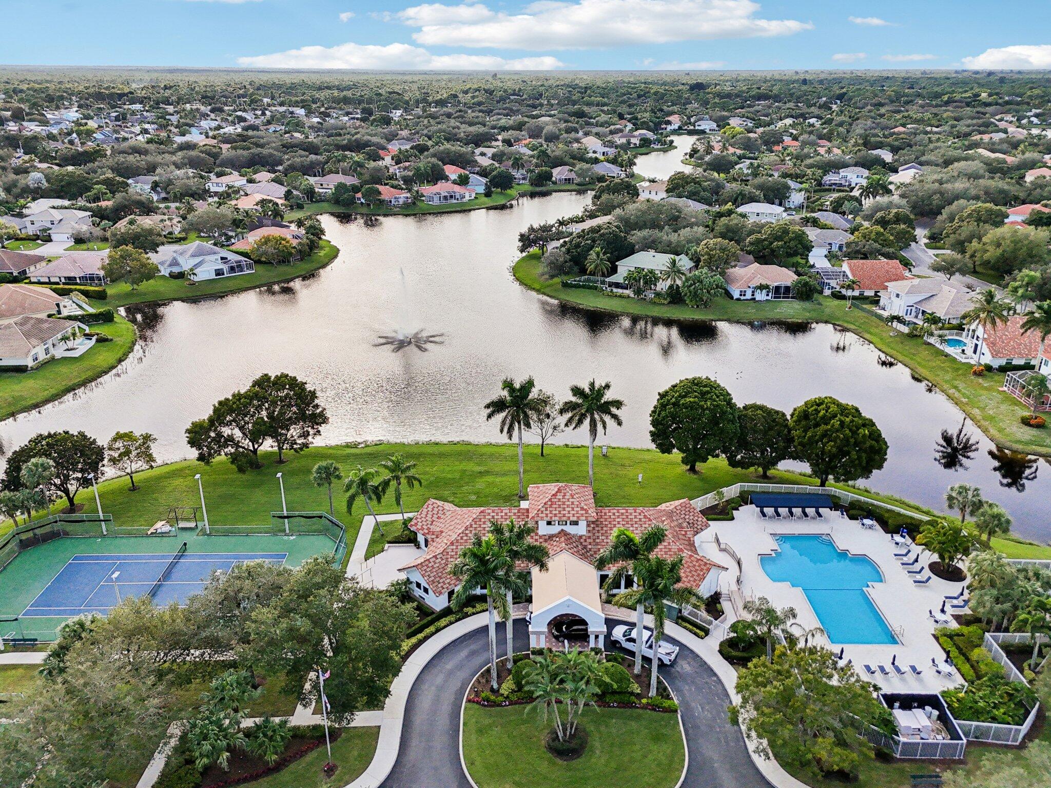 231 Sparrow Point Jupiter, FL 33458 - Photo 44 of 65 an aerial view of a house with a lake view