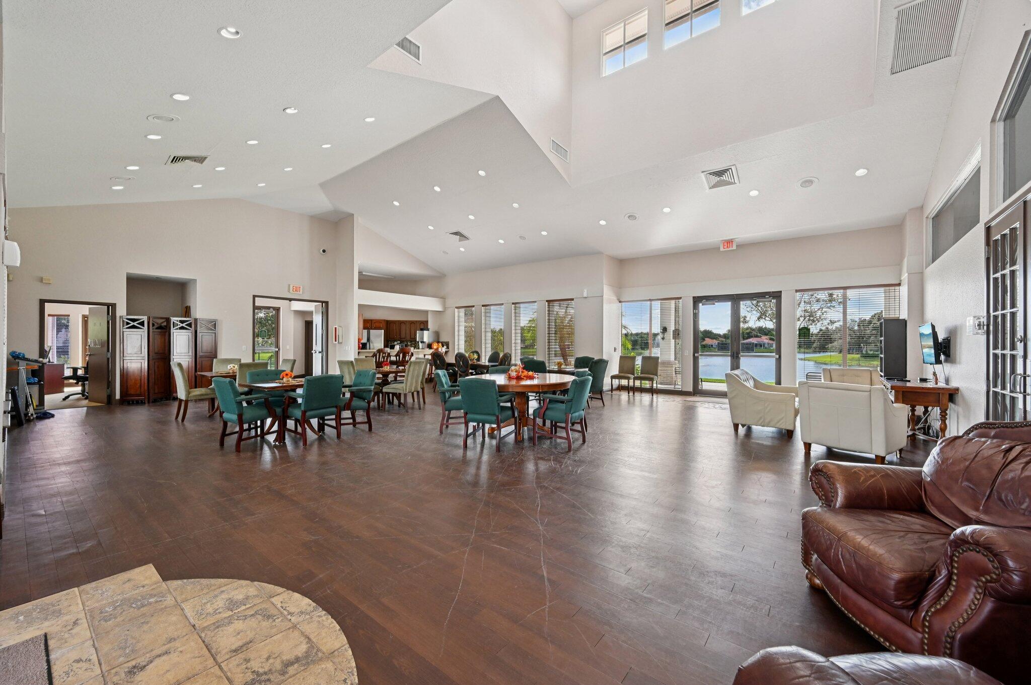 231 Sparrow Point Jupiter, FL 33458 - Photo 48 of 65 a living room with furniture and wooden floor