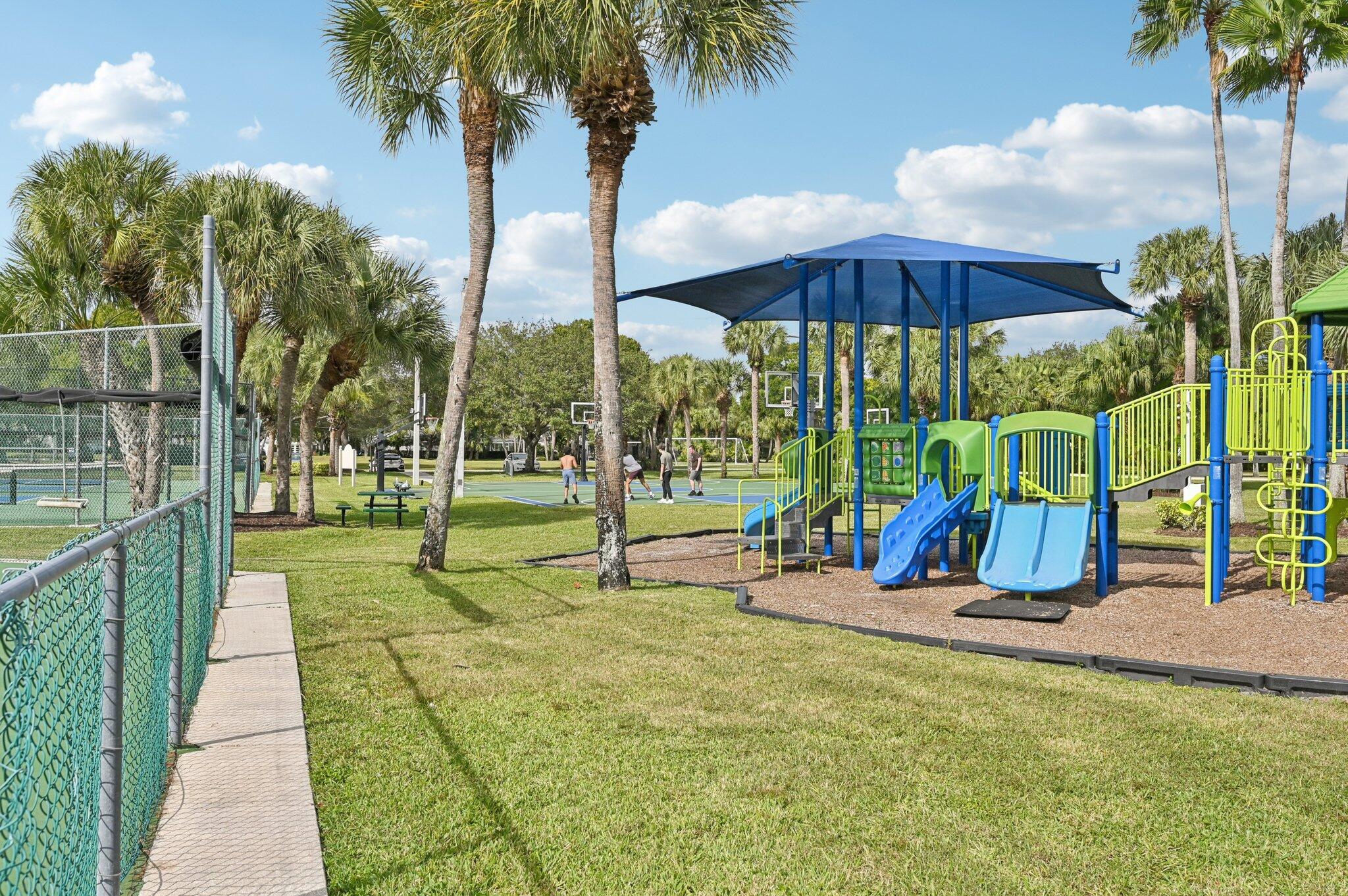 231 Sparrow Point Jupiter, FL 33458 - Photo 59 of 65 a view of a park with slide