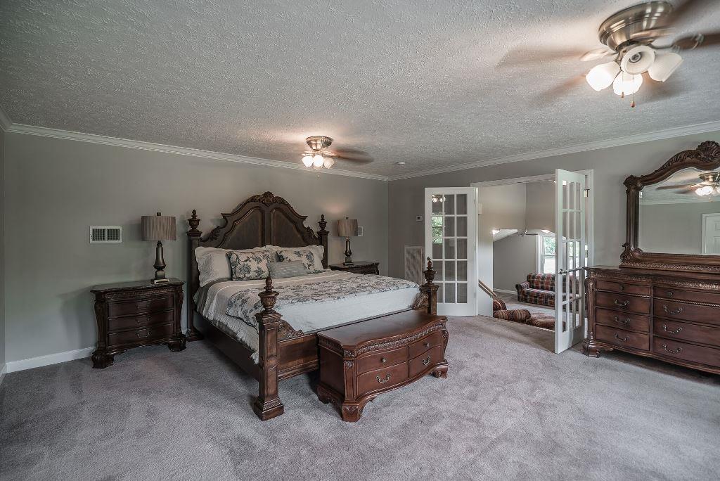 8114 Ridgewood Road Goodlettsville, TN 37072 - Photo 13 of 30 Master suite with full bath, walk-in closet and ceiling fan.