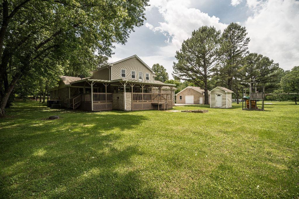 8114 Ridgewood Road Goodlettsville, TN 37072 - Photo 25 of 30 Covered back deck offers additional living space and overlooks the private back lot.