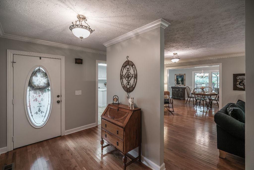 8114 Ridgewood Road Goodlettsville, TN 37072 - Photo 4 of 30 Welcoming entrance to your new home offering hardwood floors, new windows installed upstairs in 2016 and recently painted through out.