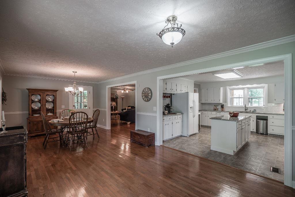 8114 Ridgewood Road Goodlettsville, TN 37072 - Photo 10 of 30 The dining area is open to the living room, kitchen and deck area. This large open area is great for entertaining.