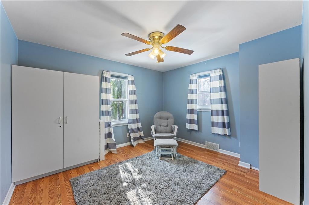 4321 Edinburg Road New Castle, PA 16102 - Photo 17 of 43 a work room with wooden floor and a rug
