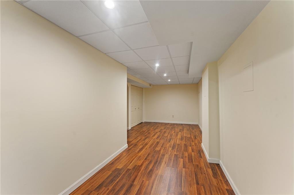 4321 Edinburg Road New Castle, PA 16102 - Photo 28 of 43 a view of hallway with wooden floor