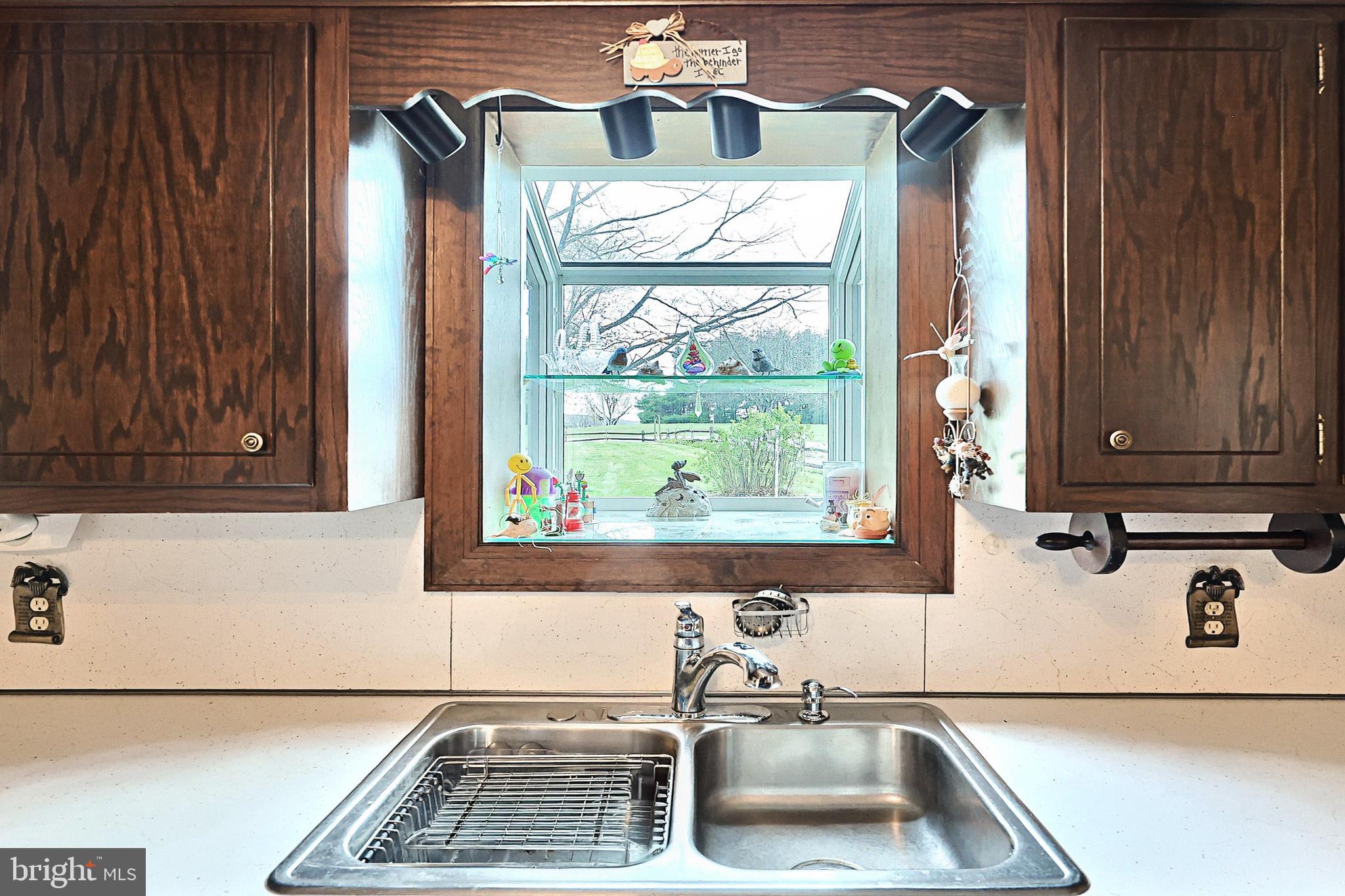 4999 Lehman Road Spring Grove, PA 17362 - Photo 15 of 32 a bathroom with a sink and a window