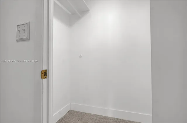 a kitchen with stainless steel appliances a refrigerator and a stove top oven