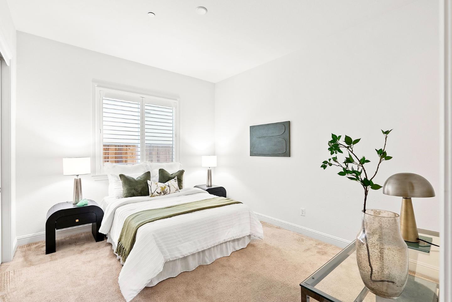 532 Hyacinthus Court San Ramon, CA 94582 - Photo 14 of 31 a bedroom with a bed a couch and potted plant