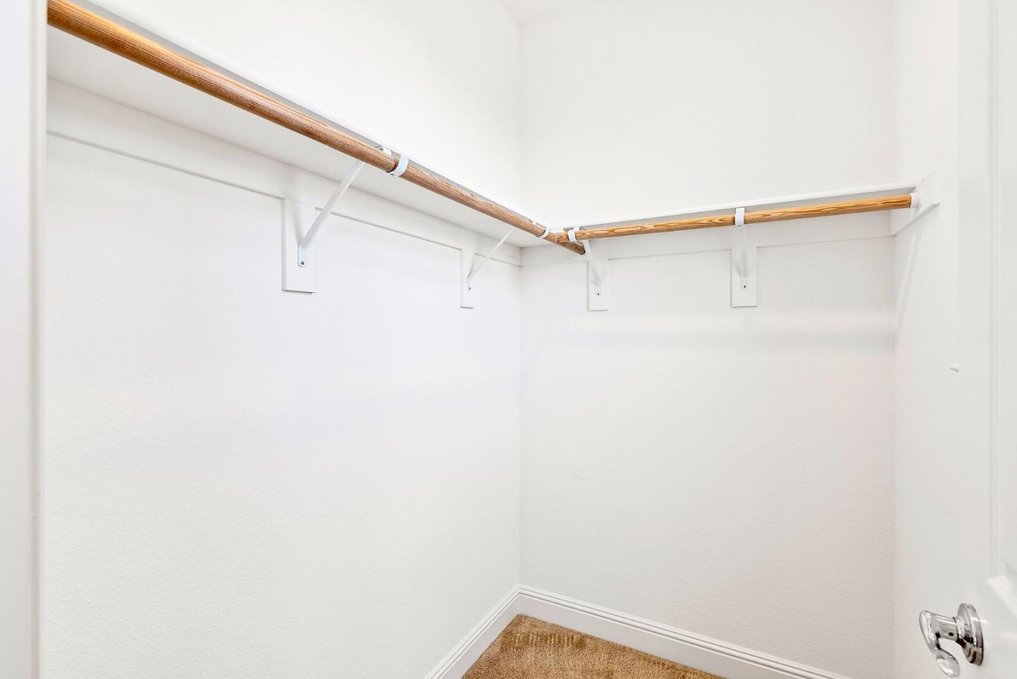 532 Hyacinthus Court San Ramon, CA 94582 - Photo 19 of 31 a view of small space with racks on the wall