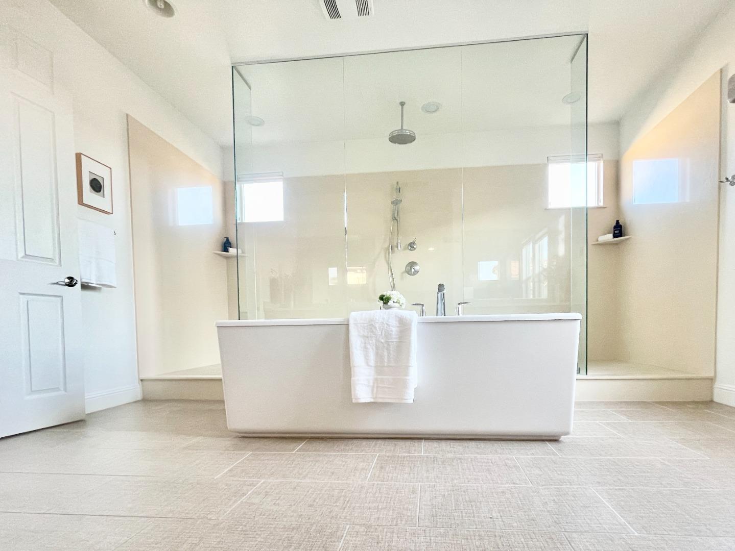 532 Hyacinthus Court San Ramon, CA 94582 - Photo 23 of 31 a white bath tub sitting in a bathroom