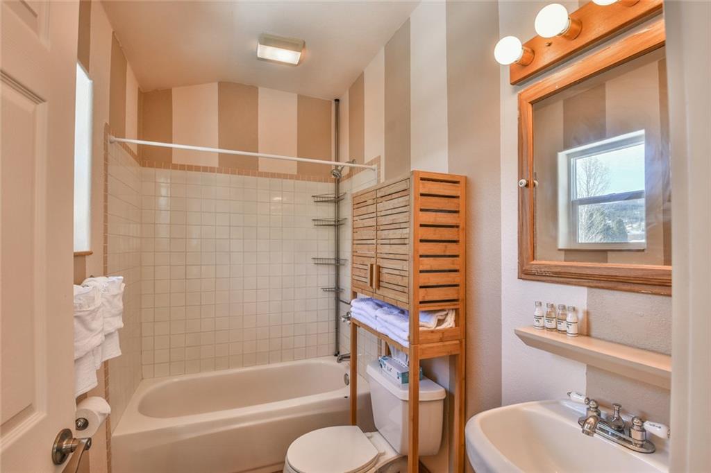 115 Reiling Road Breckenridge, CO 80424 - Photo 11 of 35 a bathroom with a sink toilet and shower