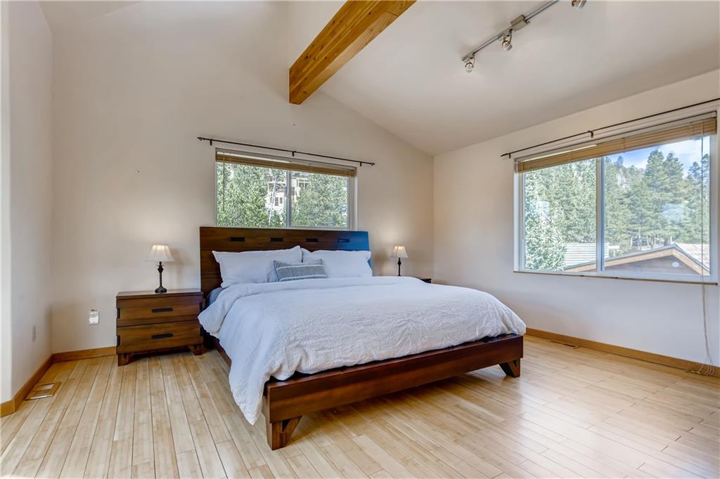 115 Reiling Road Breckenridge, CO 80424 - Photo 7 of 35 a bedroom with a bed and window