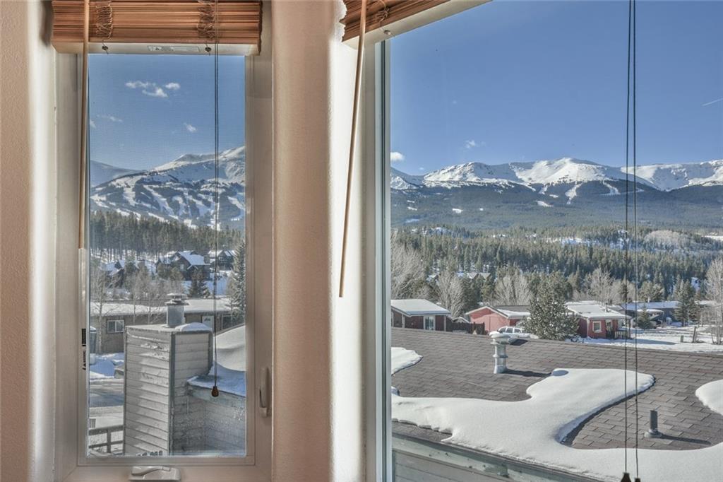 115 Reiling Road Breckenridge, CO 80424 - Photo 8 of 35 a outdoor view of a patio with a table and chairs